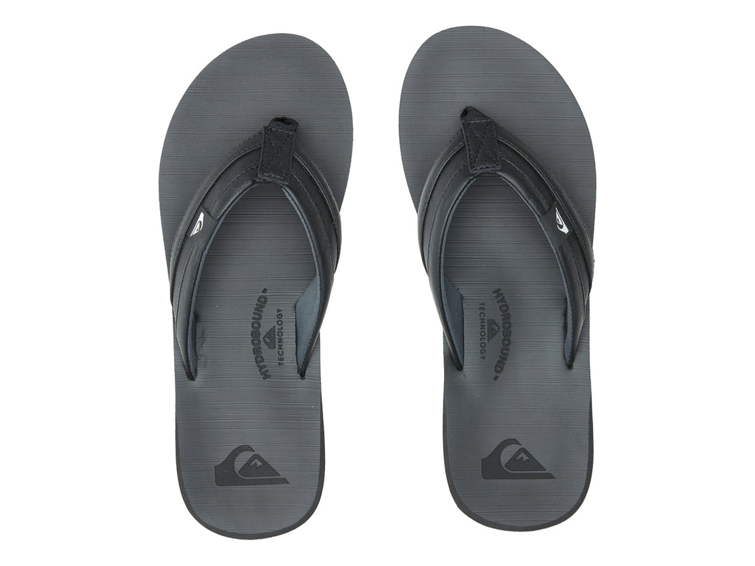 Sandalia de dedo Quiksilver Carver Squish en color negro, vista lateral sobre fondo blanco.