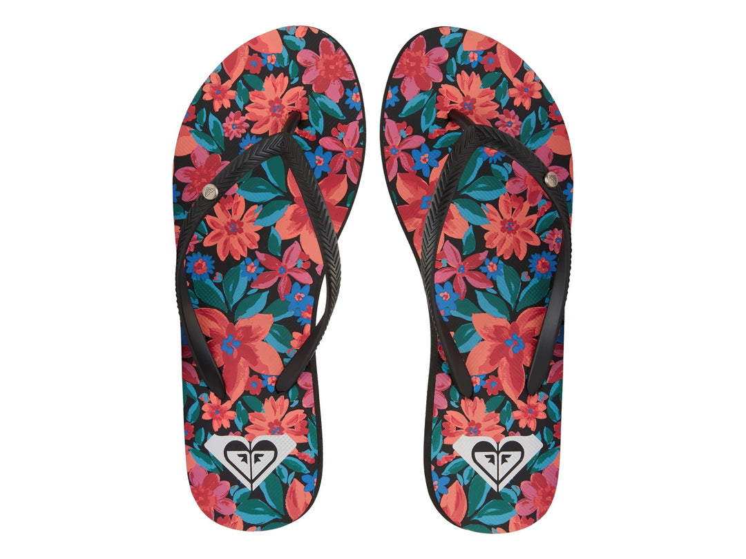Sandalias negras tipo flip-flop con suela plana y detalles decorativos en rojo.