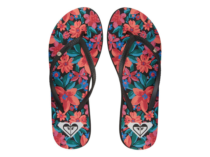 Sandalias negras tipo flip-flop con suela plana y detalles decorativos en rojo.