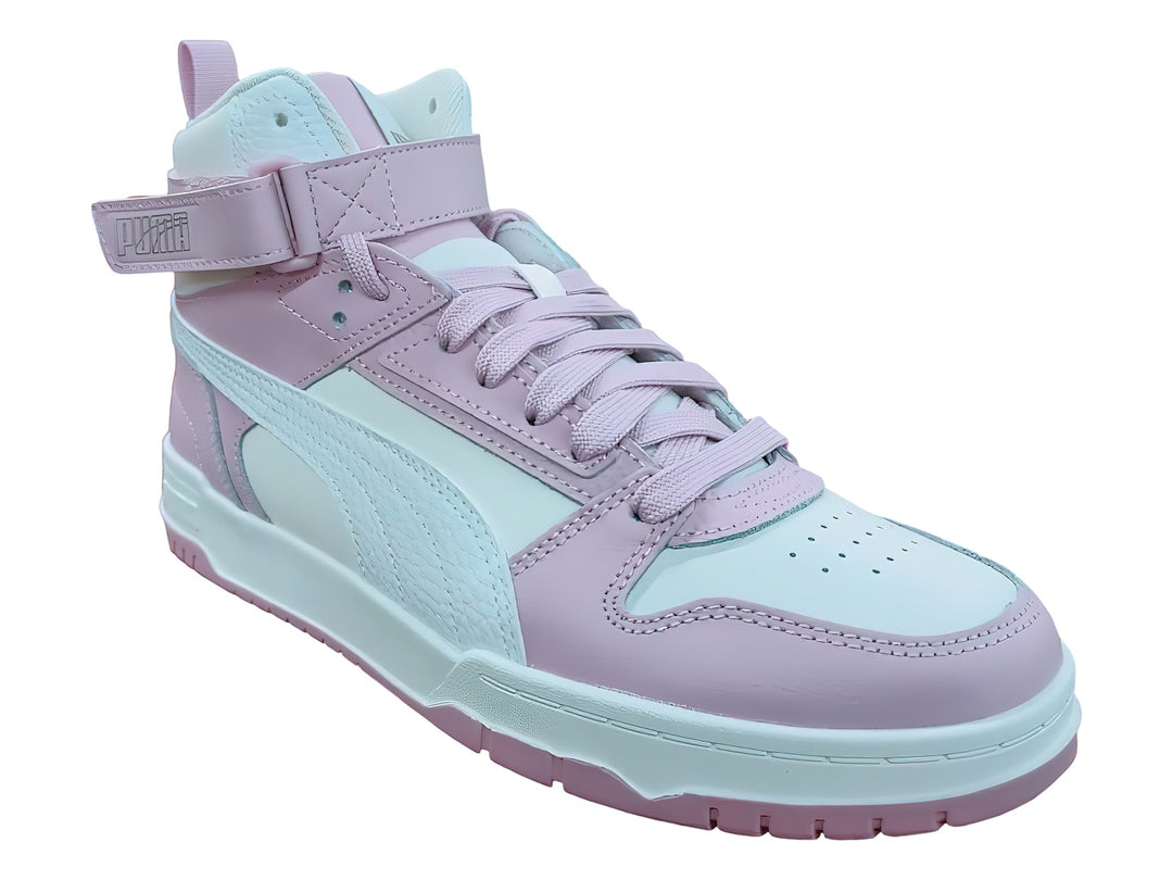 Tenis PUMA de bota alta en colores rosa y blanco con correa de velcro en el tobillo.