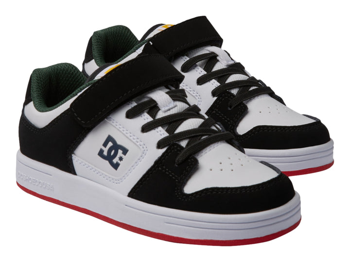 Tenis DC Shoes para niño en colores blanco, negro y rojo con cierre de velcro y agujetas.