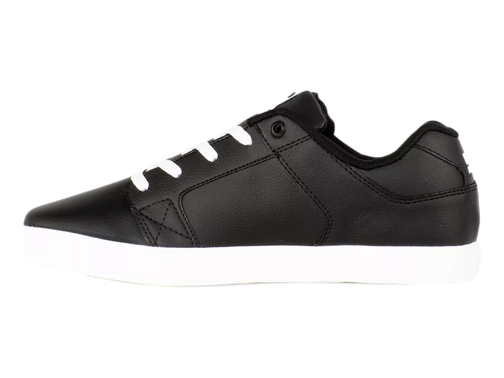 Tenis DC Shoes color negro con suela y agujetas blancas.