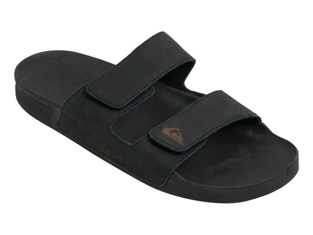 Sandalia negra de cuero Quiksilver con dos correas ajustables y suela plana.