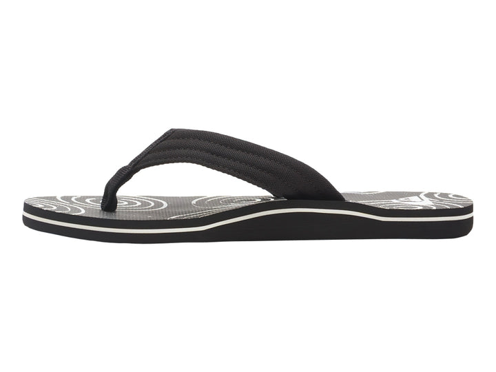 Sandalias Quiksilver negras con suela blanca y detalles gráficos en la plantilla.