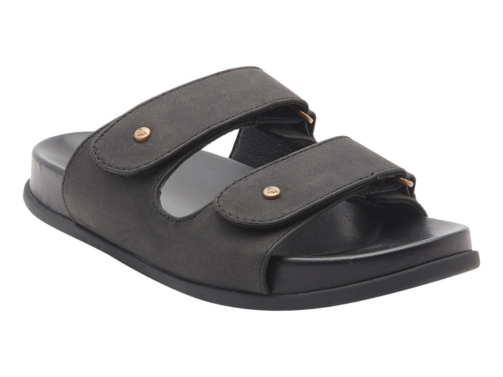 Sandalia slide negra con dos correas y botones decorativos dorados.