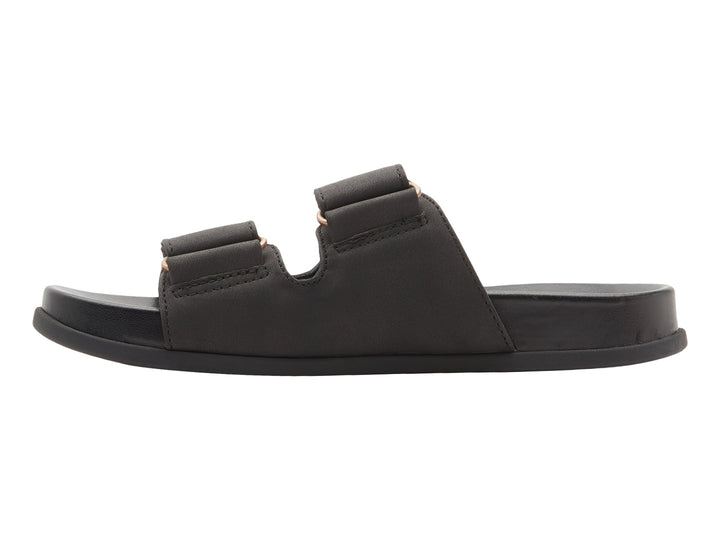 Sandalia slide negra con dos correas y botones decorativos dorados.