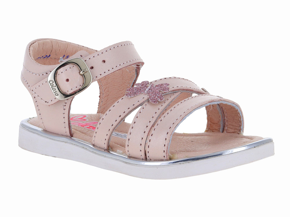Sandalia rosa para niña con detalle de moño brillante, hebilla plateada y suela blanca.