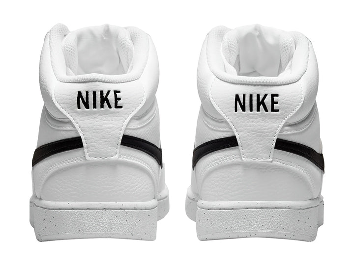 Tenis Nike Court Vision Mid color blanco con logotipo negro, diseño de corte medio.