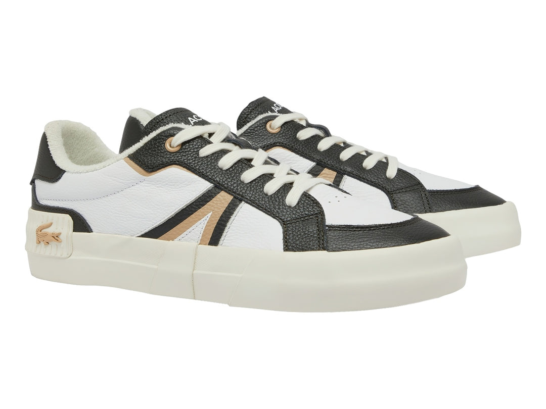 Tenis Lacoste blancos con detalles en negro y dorado y suela blanca ancha.