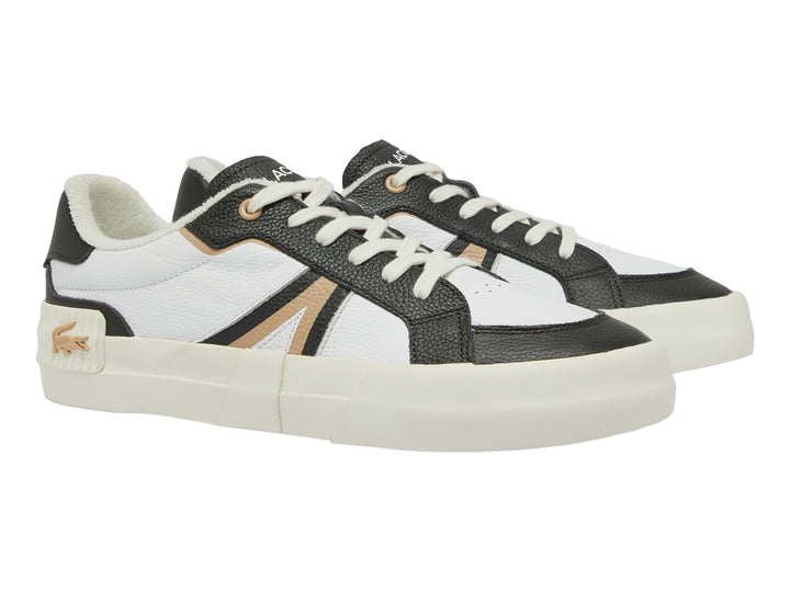 Tenis Lacoste blancos con detalles en negro y dorado y suela blanca ancha.
