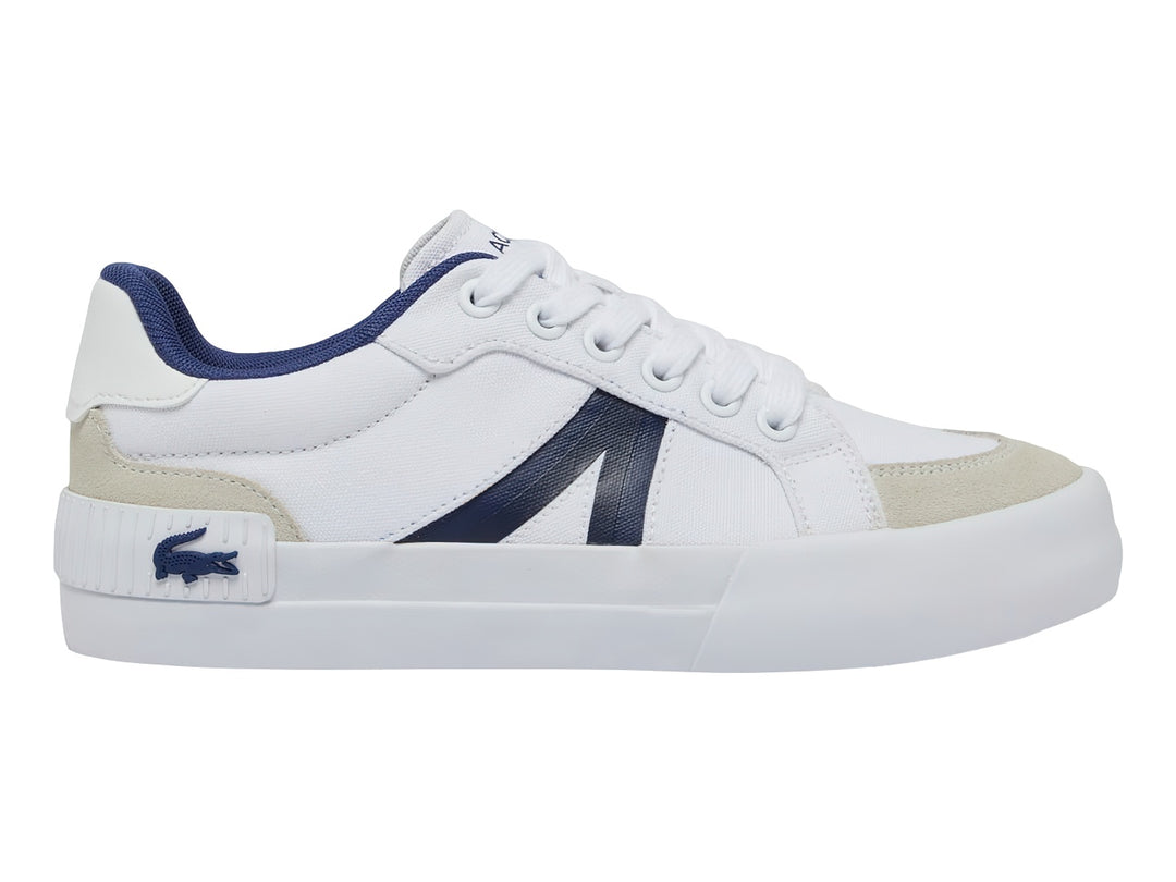 Tenis Lacoste blancos con detalles en azul marino y beige, diseño deportivo para niños.
