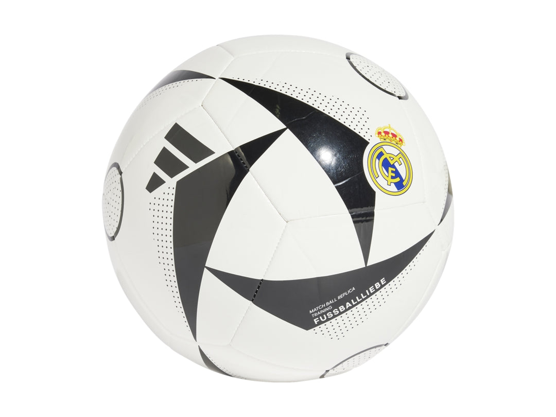 Balón de fútbol Adidas blanco con detalles en negro y el escudo del Real Madrid.