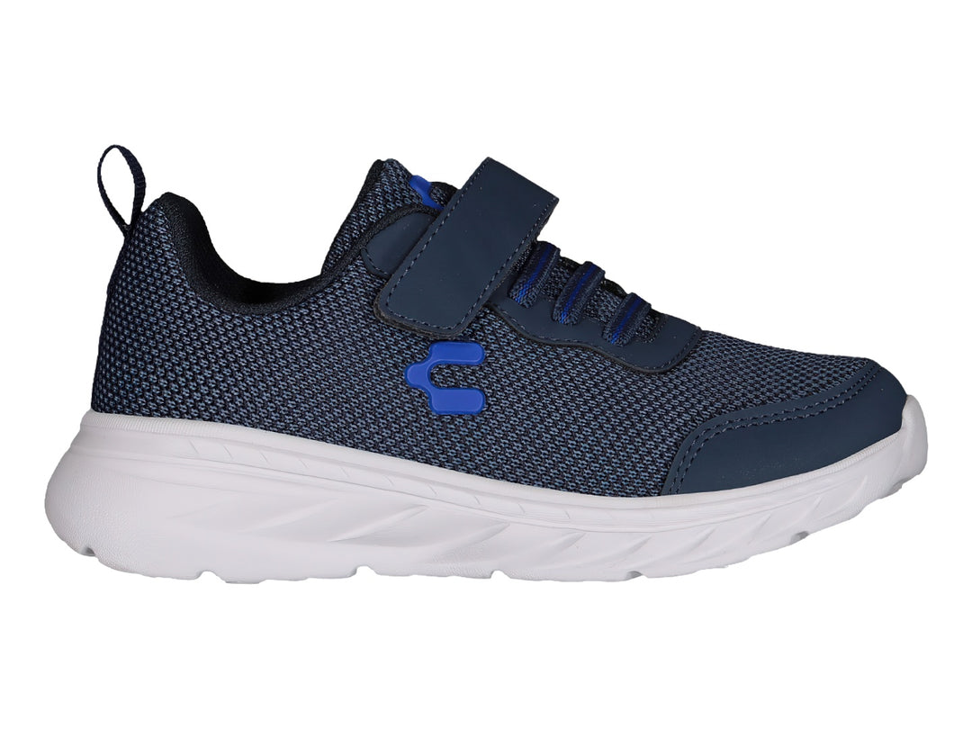 Tenis deportivos Charly color azul marino con suela blanca y correa de velcro.