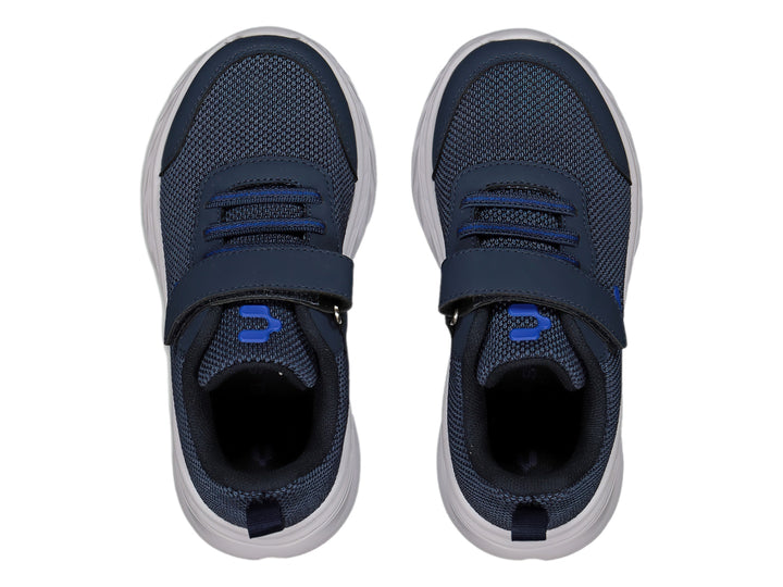 Tenis deportivos Charly color azul marino con suela blanca y correa de velcro.