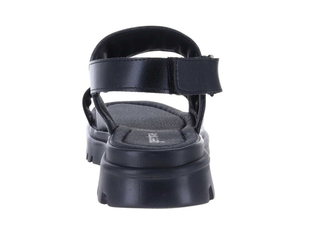 Sandalia negra de plataforma con correas cruzadas y suela track para mujer.