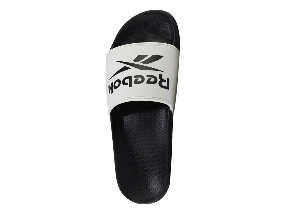 Sandalia deslizable Reebok con correa blanca y suela negra.