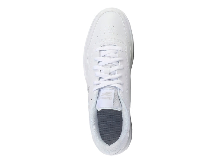 Tenis deportivos Reebok de color blanco total con suela blanca y agujetas blancas.