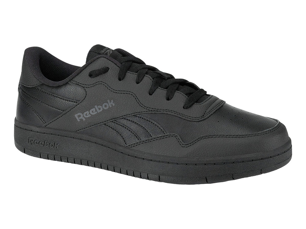 Tenis Reebok color negro con suela plana y cordones, vista lateral.