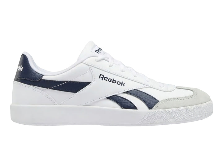Tenis Reebok Smash Edge en color blanco con detalles laterales en negro y punta gris.