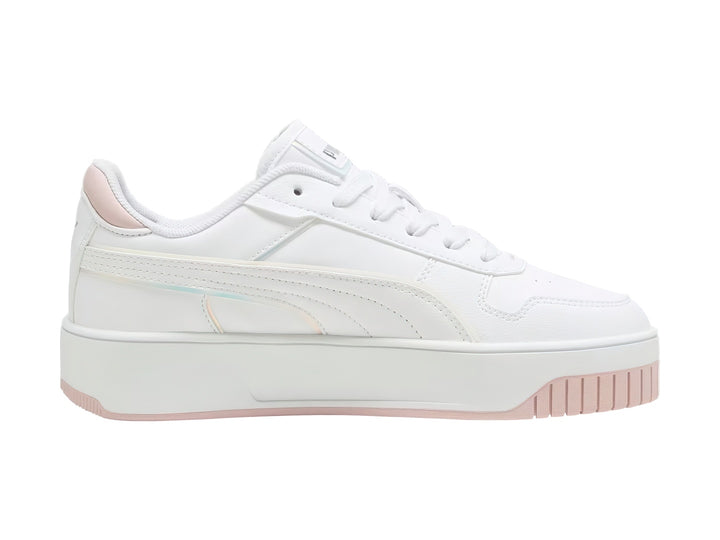 Tenis PUMA Carina Street Holo 2.0 JR en color blanco con detalles en rosa y franja lateral holográfica.