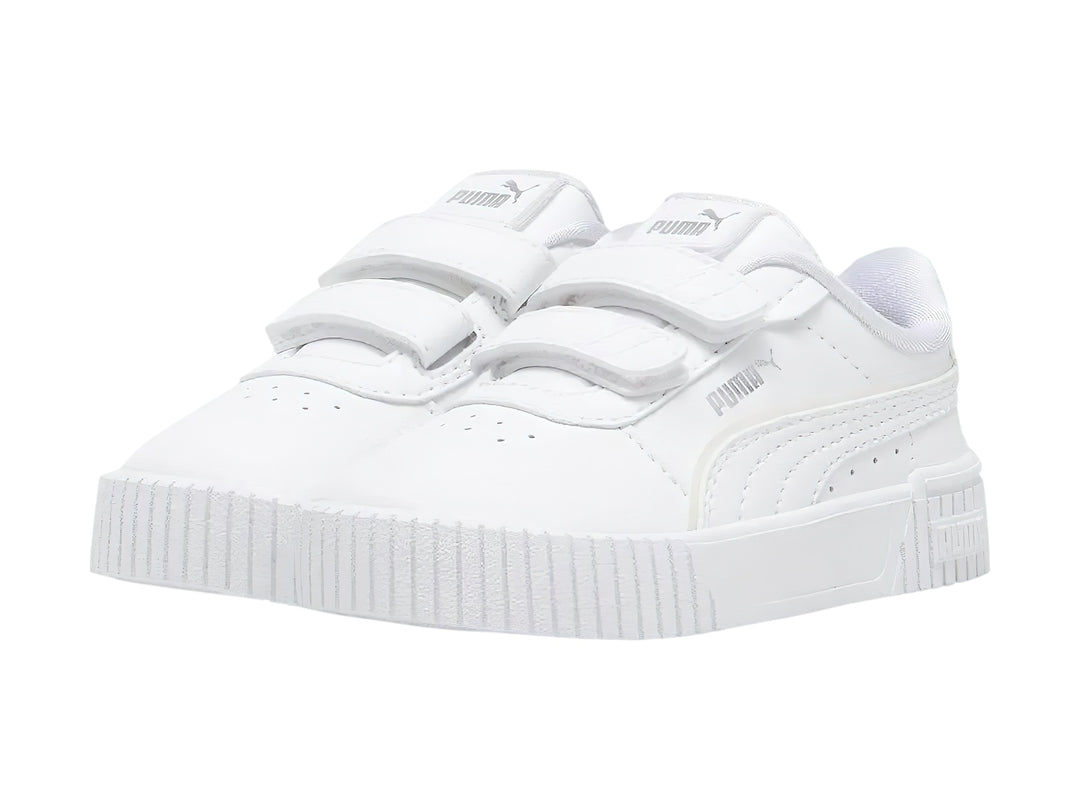 Tenis PUMA blancos para Niño o Niña con cierre de velcro y detalle holográfico en el talón.