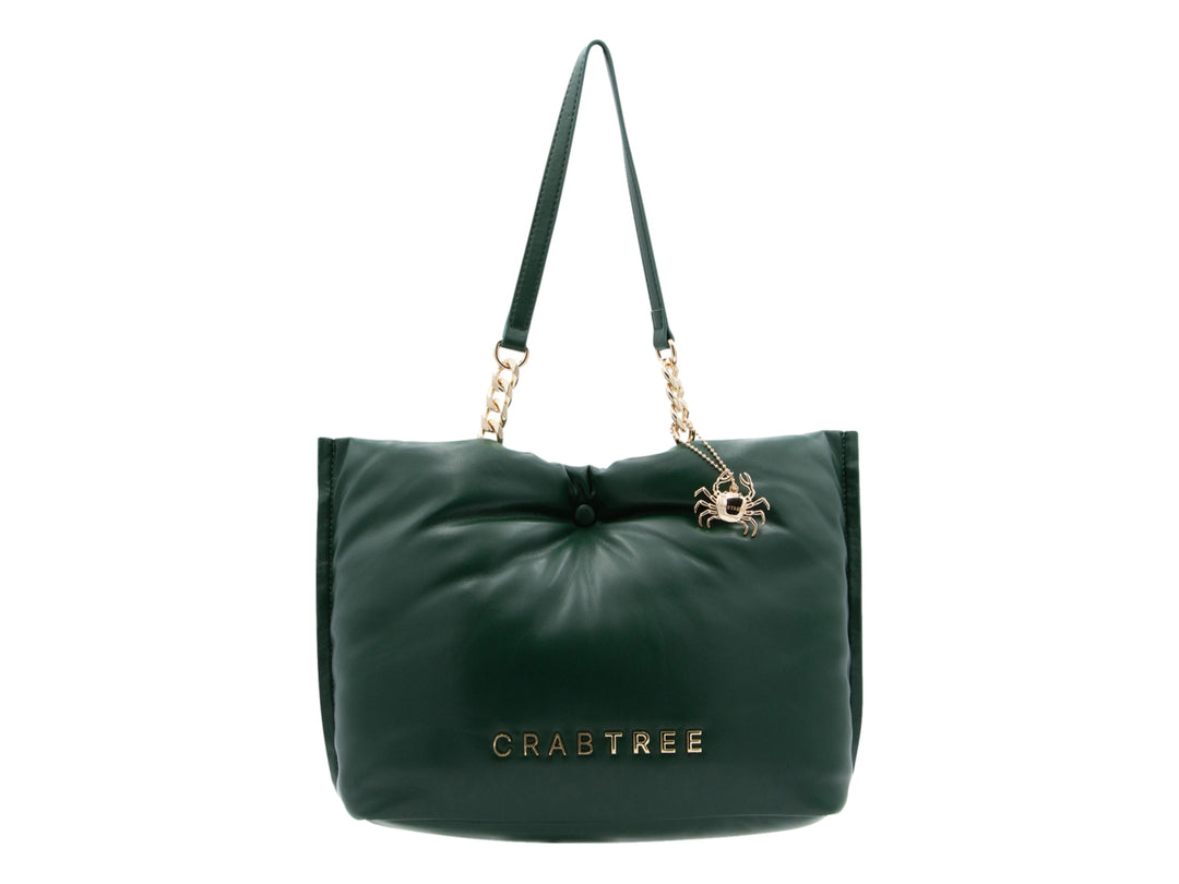 Bolso de hombro verde oscuro con detalles en dorado y diseño fruncido en la parte superior.