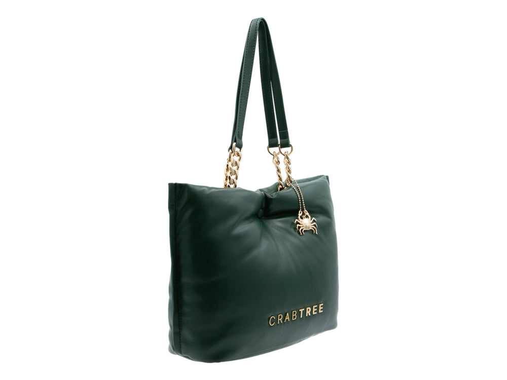 Bolso de hombro verde oscuro con detalles en dorado y diseño fruncido en la parte superior.