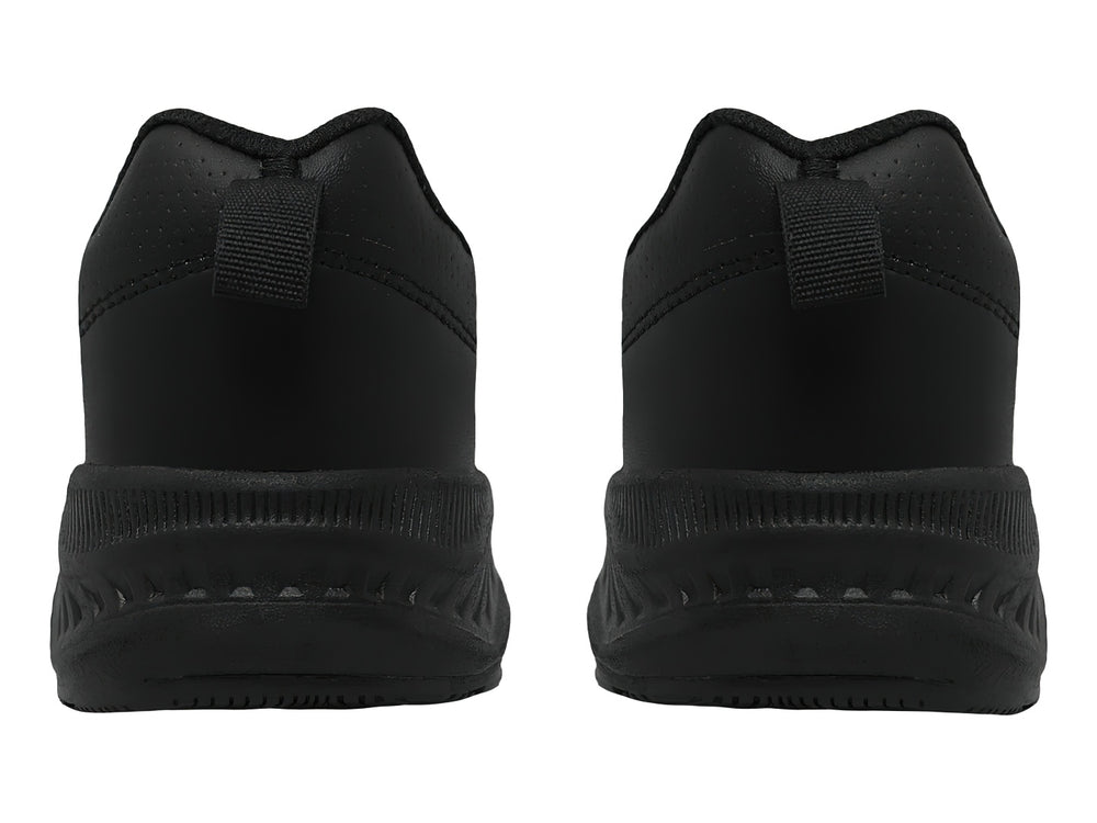 Zapato deportivo negro con cierres de velcro y suela gruesa.