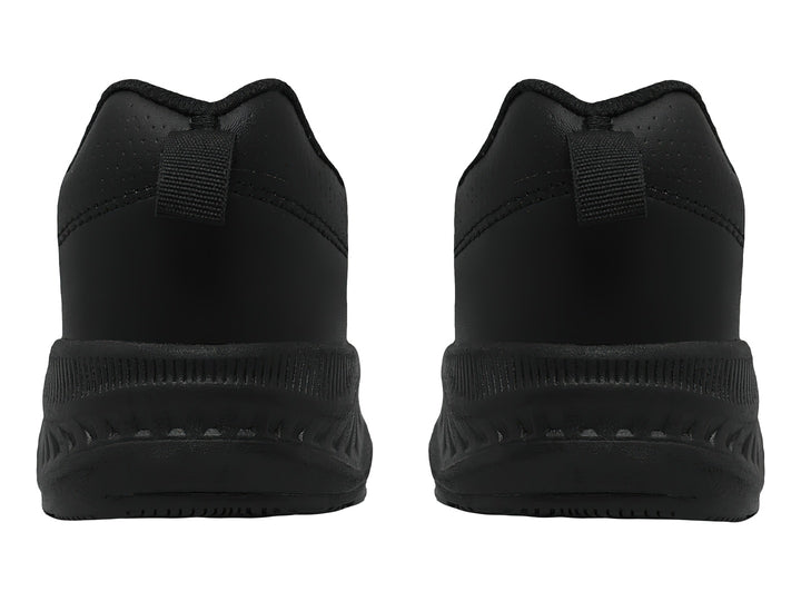 Zapato deportivo negro con cierres de velcro y suela gruesa.
