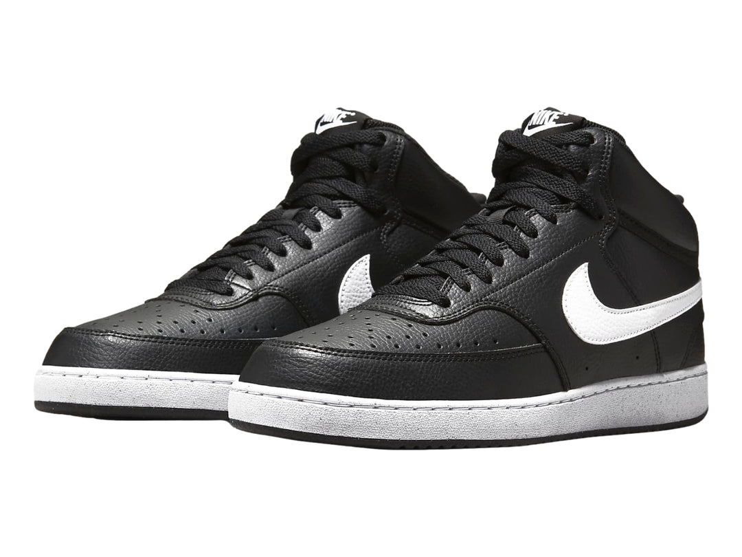 Tenis Nike Court Vision Mid color negro con suela y logotipo en blanco.