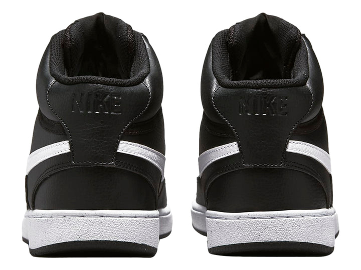 Tenis Nike Court Vision Mid color negro con suela y logotipo en blanco.