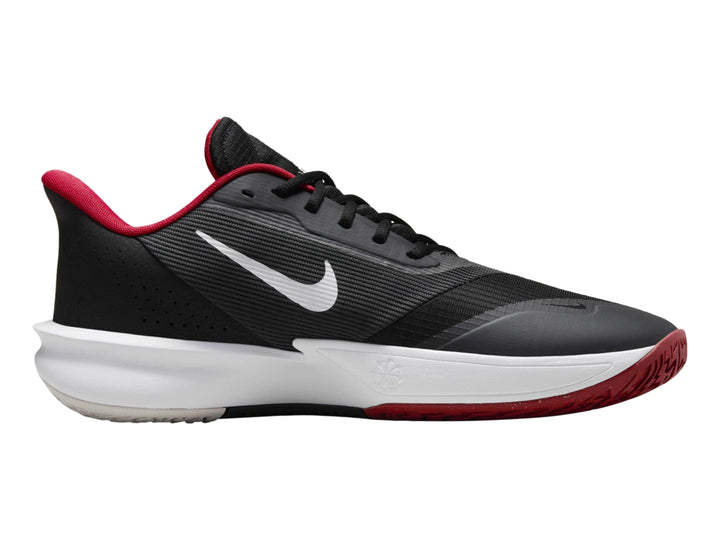 Tenis de baloncesto Nike Precision VII color negro con suela blanca y detalles en rojo.