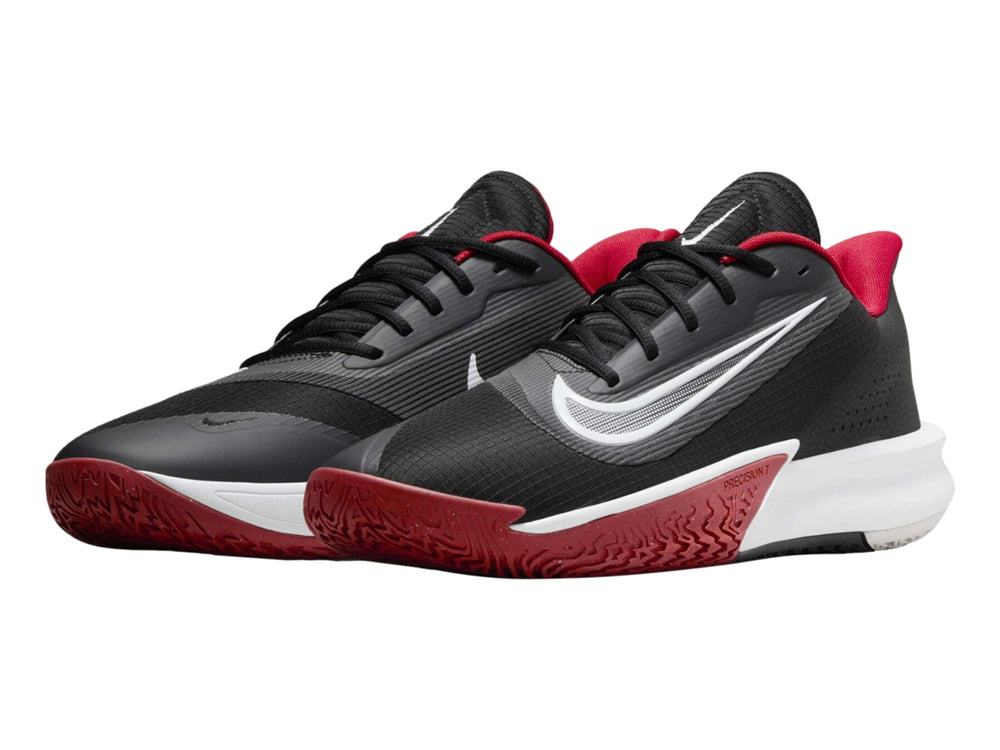 Tenis de baloncesto Nike Precision VII color negro con suela blanca y detalles en rojo.