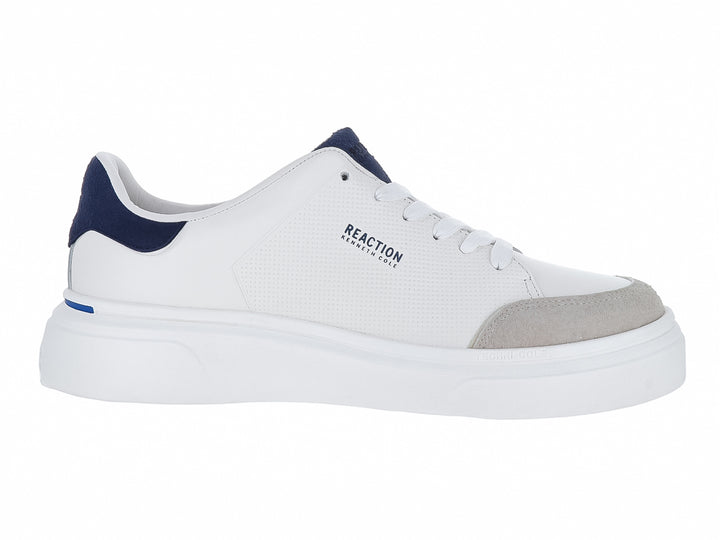 Tenis Kenneth Cole Reaction en color blanco con detalles en azul marino y punta gris, suela blanca ancha.