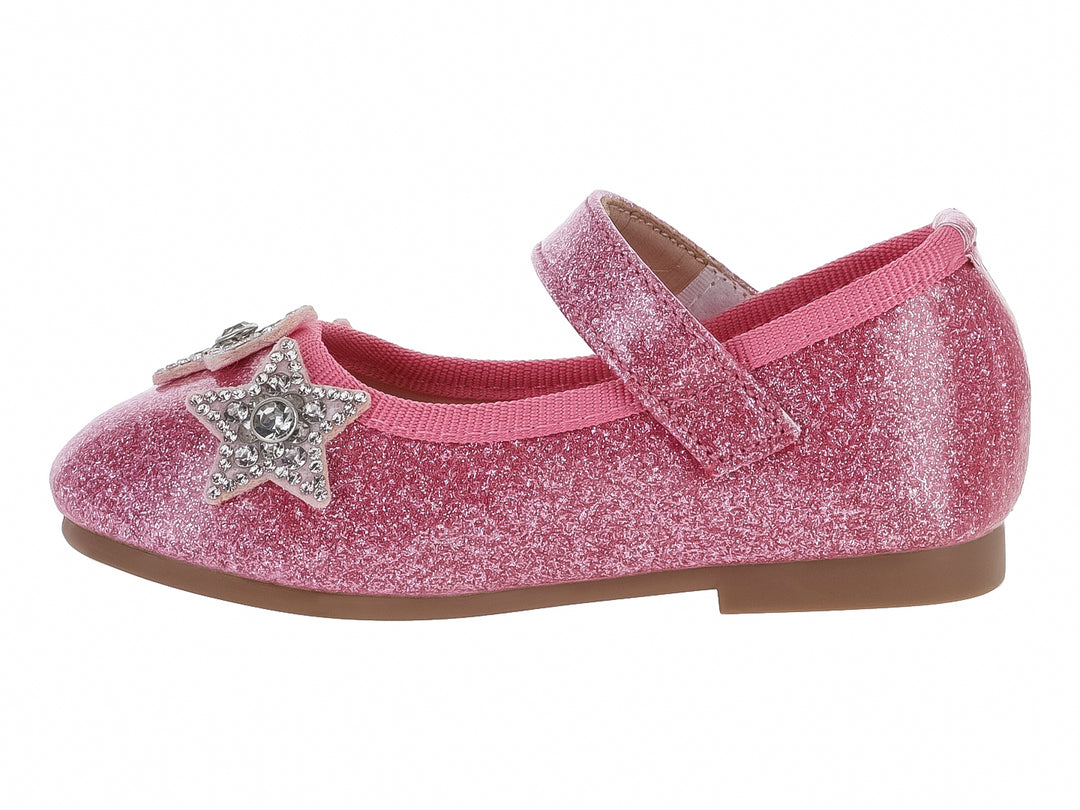 Zapato plano rosa con acabado de brillos y adornos de estrellas plateadas para niña.