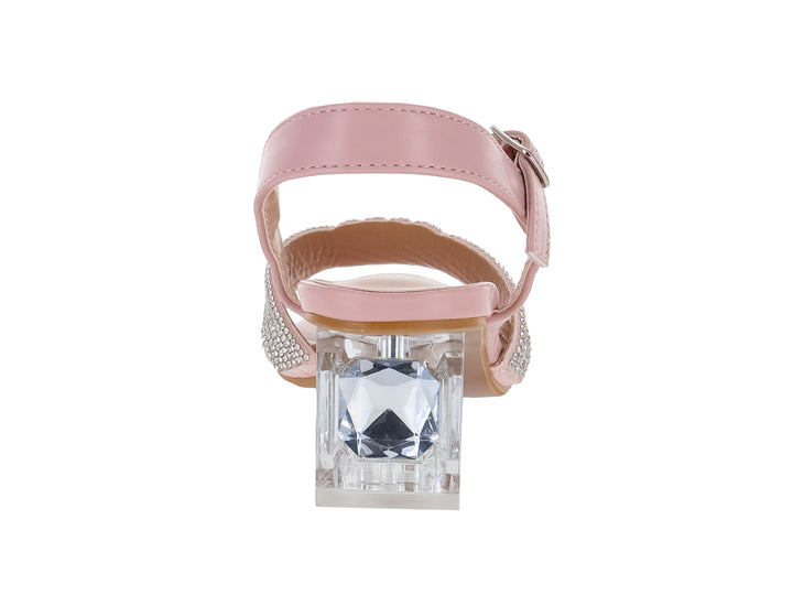 Sandalia color rosa para niña con tacón bajo transparente y correa frontal decorada con pedrería plateada.