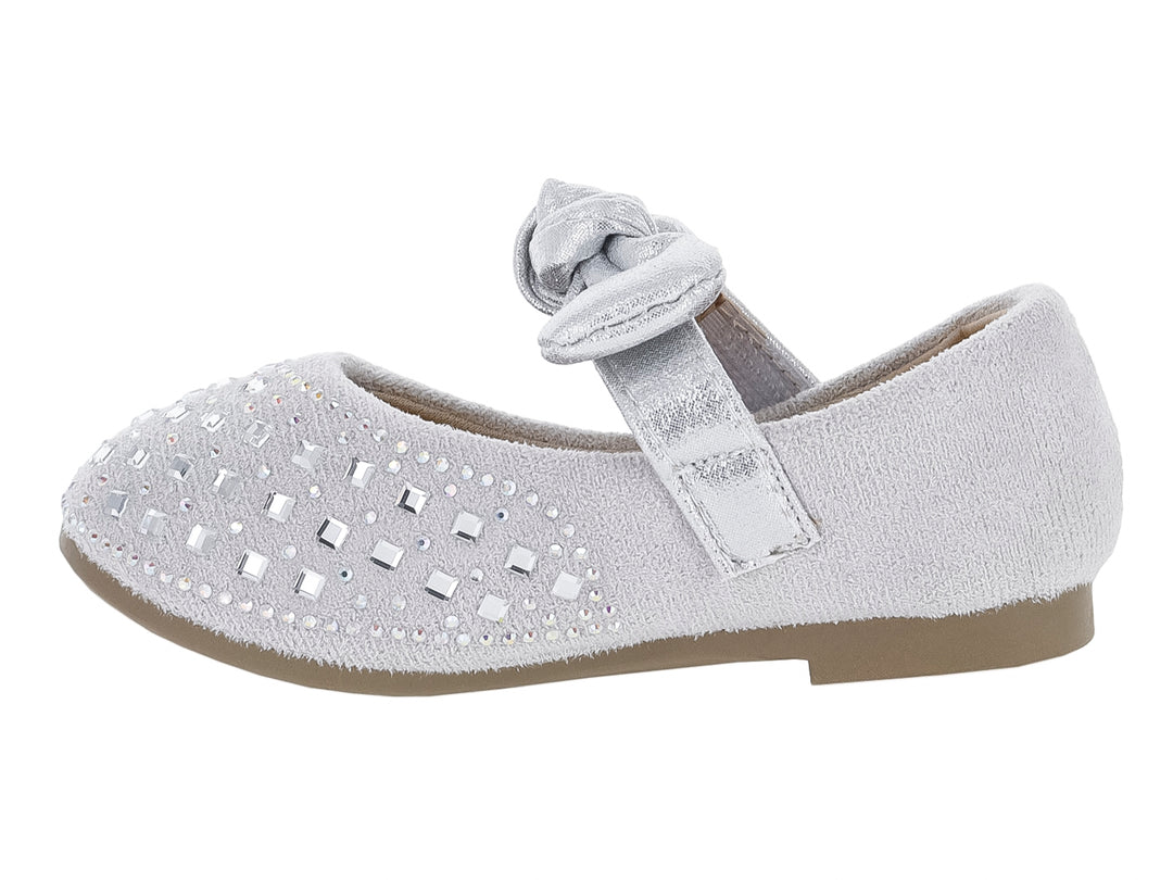 Zapato plano plateado para Niña con moño decorativo y detalles brillantes.