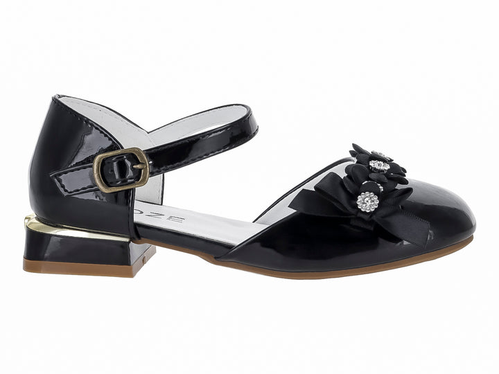 Zapato negro de charol para niña con moño decorativo, pedrerías y correa ajustable al tobillo.