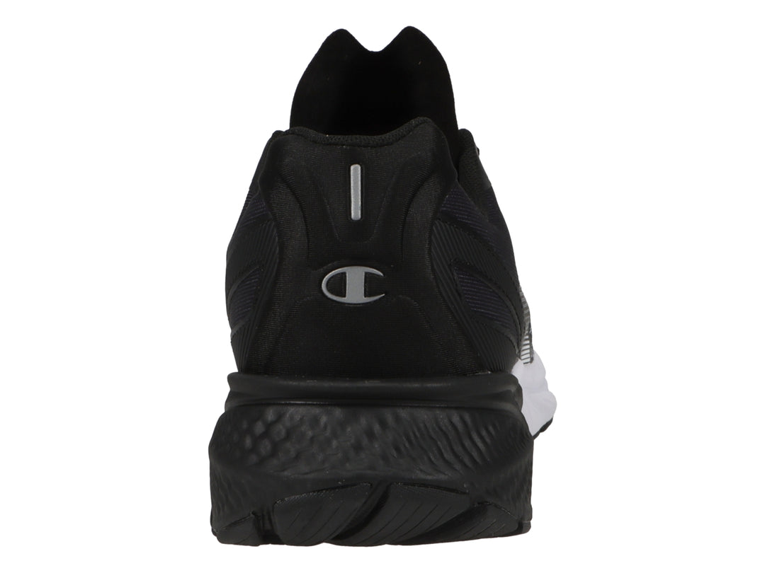 Tenis deportivos Champion en colores negro y blanco con diseño degradado de puntos y suela blanca.