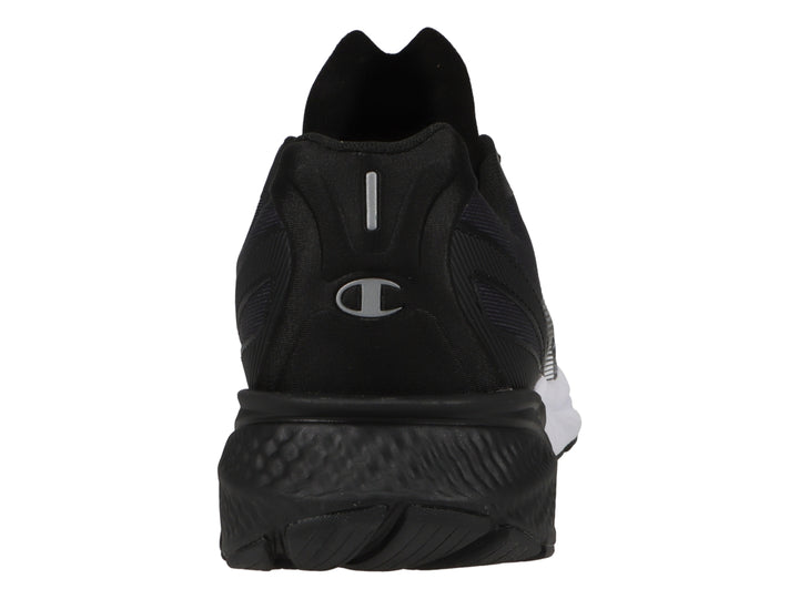 Tenis deportivos Champion en colores negro y blanco con diseño degradado de puntos y suela blanca.