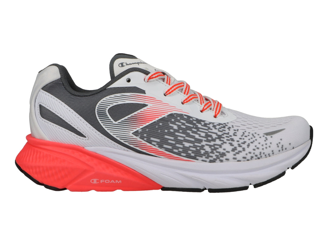 Tenis deportivos Champion color blanco con detalles en gris y suela roja.
