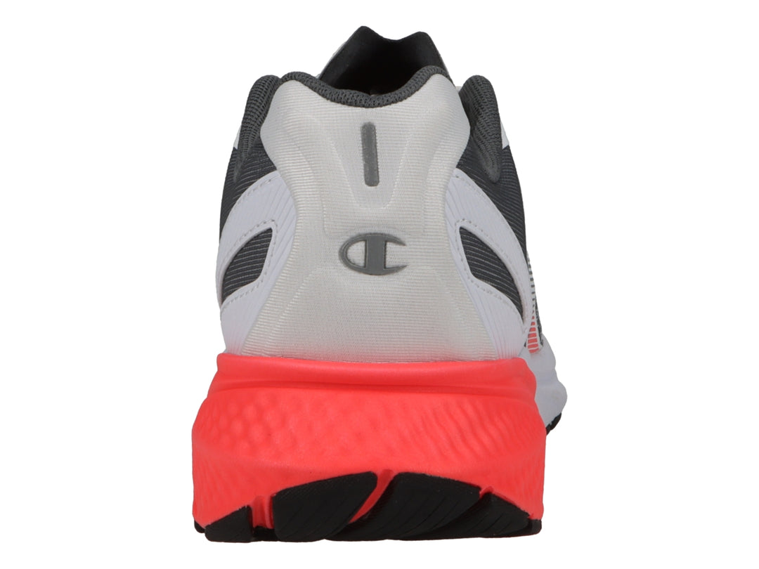 Tenis deportivos Champion color blanco con detalles en gris y suela roja.