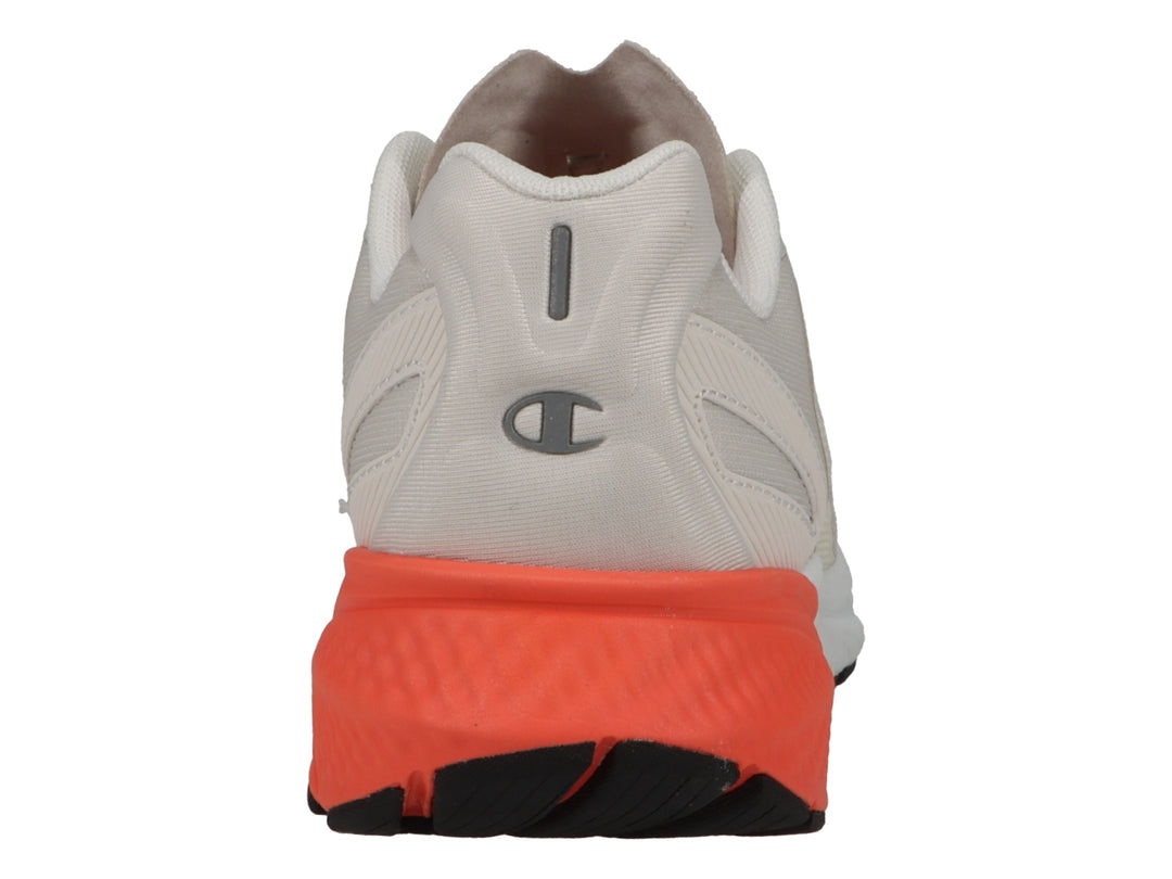 Tenis deportivos Champion color beige con detalles en coral y blanco.