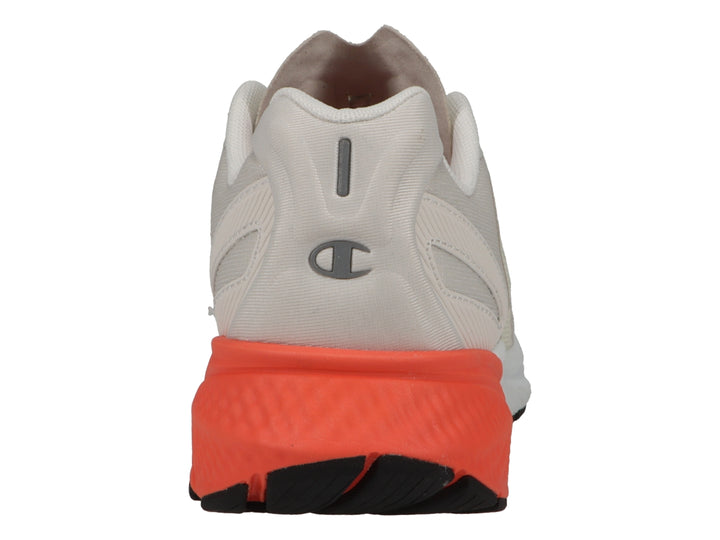 Tenis deportivos Champion color beige con detalles en coral y blanco.