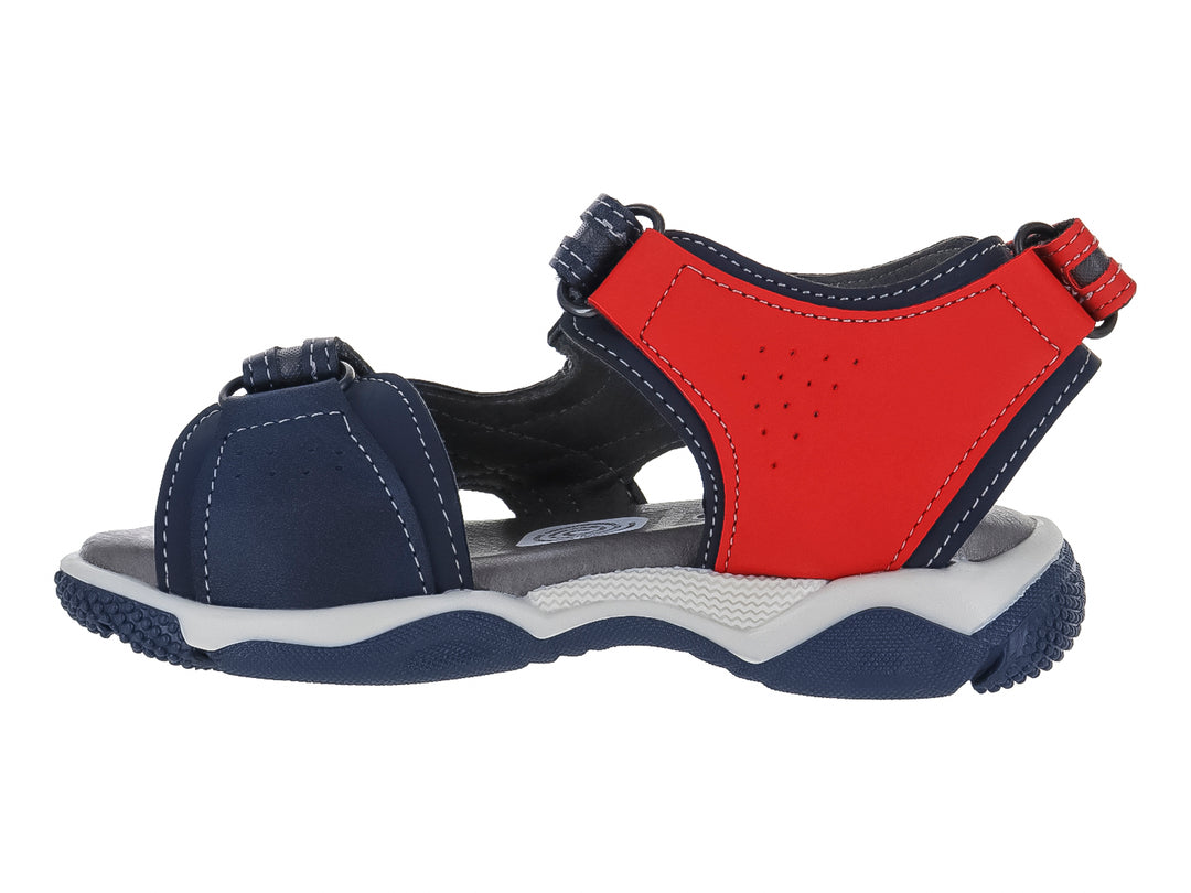 Sandalia infantil de color azul marino y rojo con suela gris y blanca.