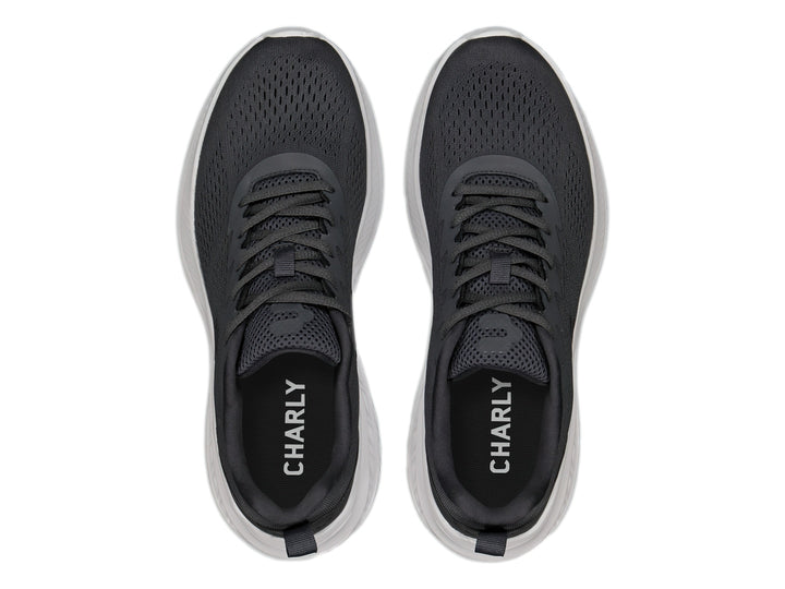Tenis deportivos Charly color gris oxford con suela blanca y tejido transpirable.
