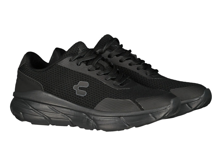 Tenis deportivos Charly color negro total con malla transpirable y suela robusta.
