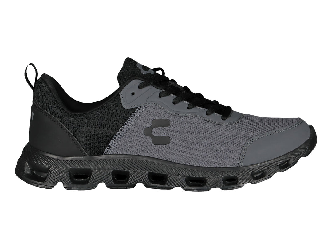 Tenis deportivos Charly en color negro y gris oxford con suela robusta y tejido de malla.