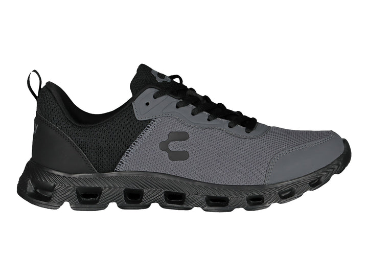 Tenis deportivos Charly en color negro y gris oxford con suela robusta y tejido de malla.