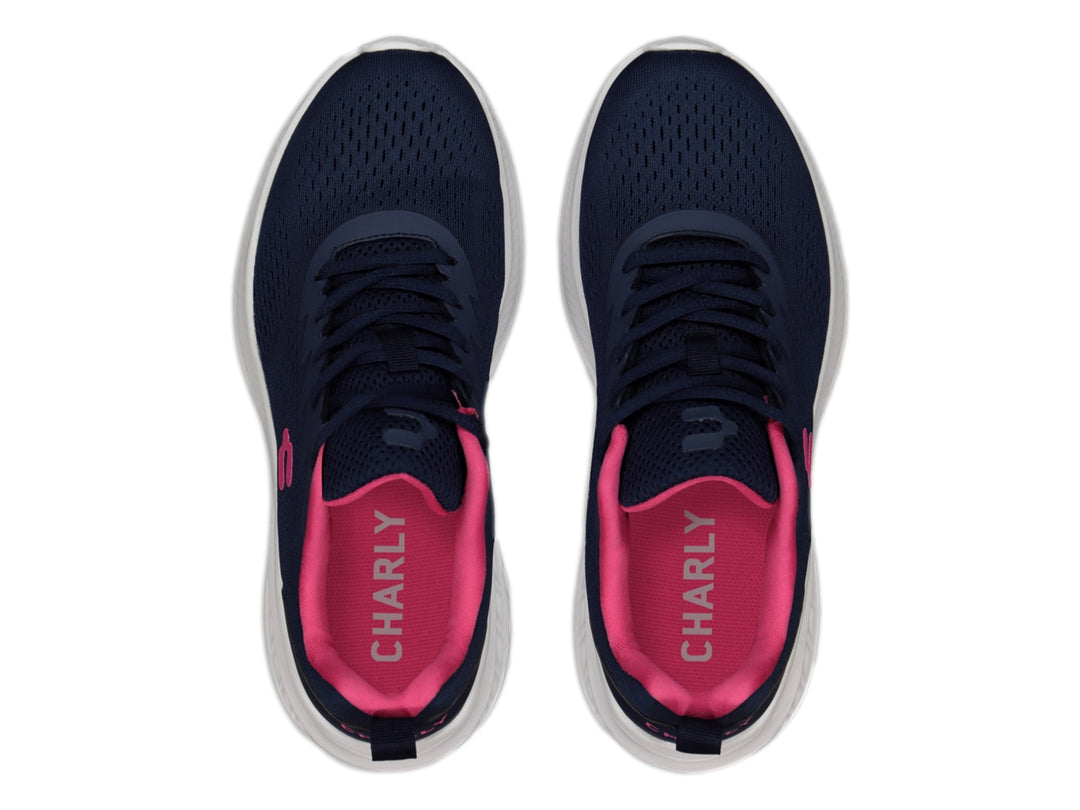 Tenis deportivos Charly color azul marino con detalles en fucsia y suela blanca.